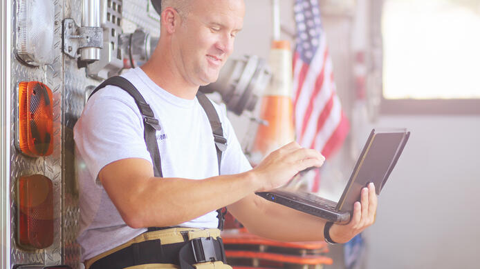 Firefighter on a laptop