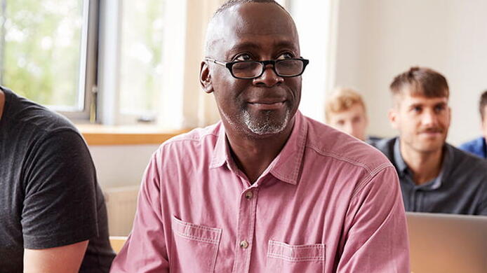 What are some common obstacles in life when going back to school as an adult?