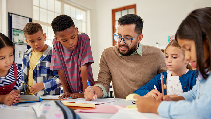Elementary teacher in class with students
