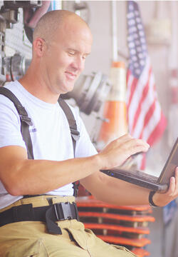Firefighter on a laptop