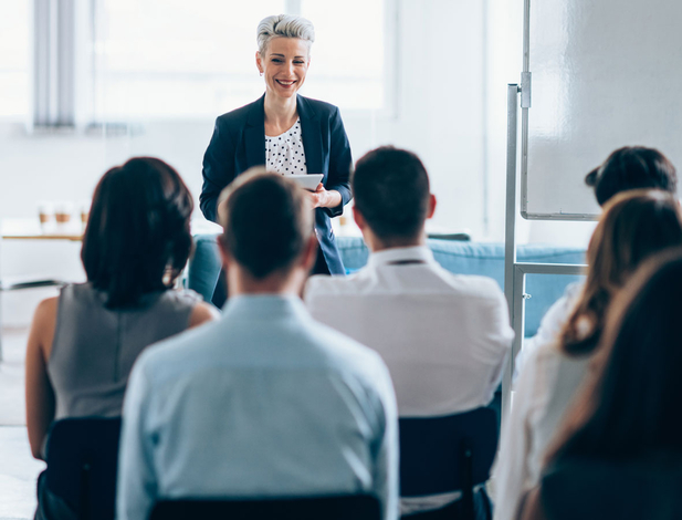 Businesswoman leading a training class for professionals