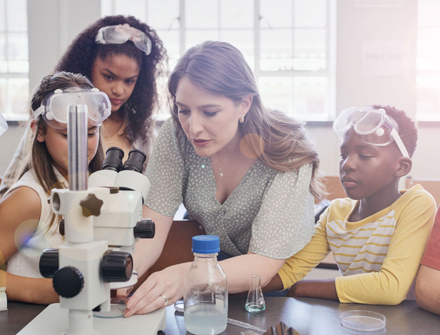 Elementary teacher teaching science to students