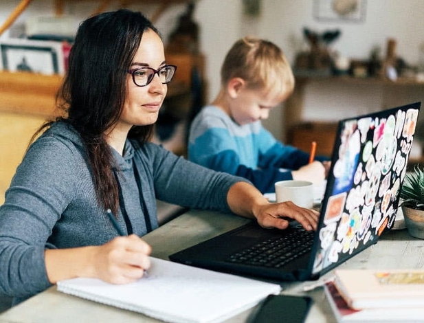 Mother working from home.